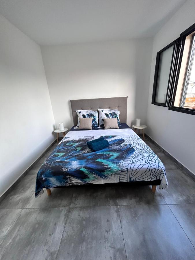 Arbre A Pain Hotel Bras-Panon Bagian luar foto